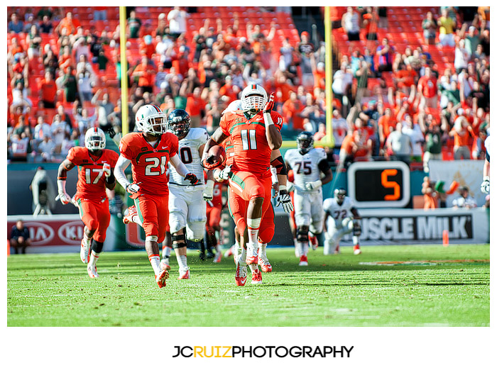 Hurricanes defensive player #11, David Gilbert, runs for a touchdown after a fumble recovery