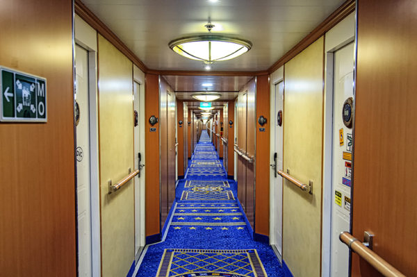 Hallway full of Disney Magic staterooms