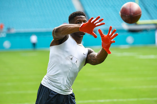 Chicago Bears wide receiver Anthony Miller (17) warmups by catching passes from the jugs machine