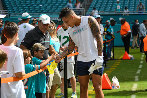 Miami Dolphins wide receiver Kenny Stills (10) greets fans