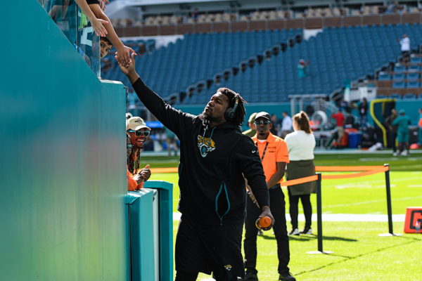 Greeting fans prior to the game