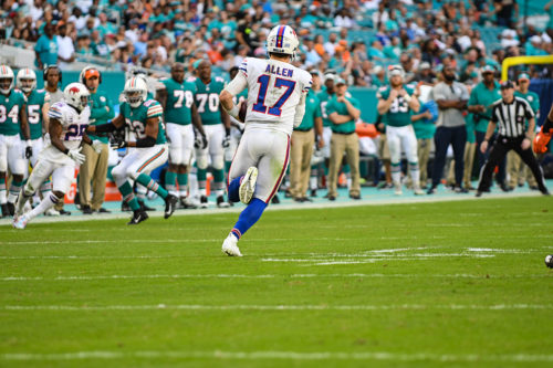 Buffalo Bills quarterback Josh Allen (17) runs for a first down