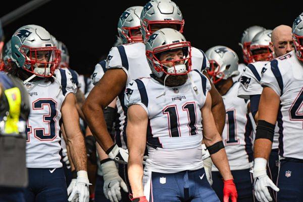 New England Patriots wide receiver Julian Edelman (11) and the rest of the New England Patriots line up to run out of the tunnel