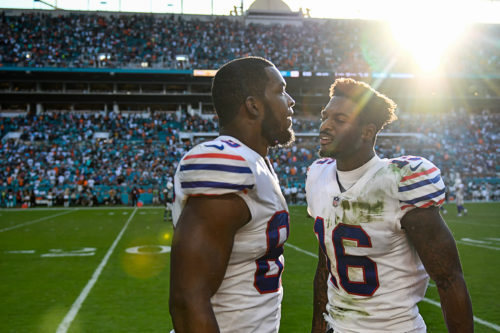 Buffalo Bills wide receiver Robert Foster (16) tries to encourage Buffalo Bills tight end Charles Clay (85)