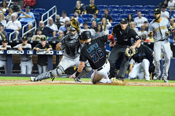 Miami Marlins left fielder Garrett Cooper #26 - Pittsburgh Pirates vs. Miami Marlins at Marlins Park