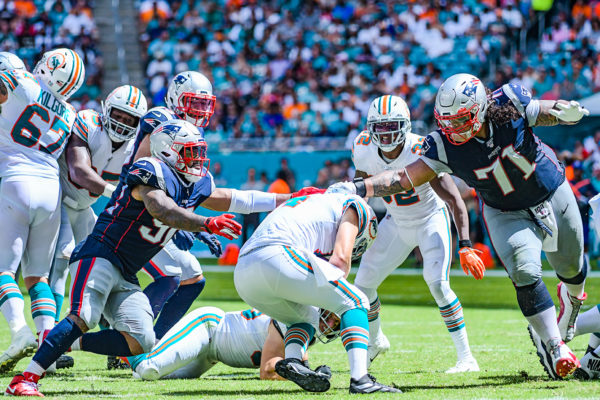 Miami Dolphins quarterback Ryan Fitzpatrick #14 is sacked | New England Patriots vs. Miami Dolphins | September 15, 2019 | Hard Rock Stadium